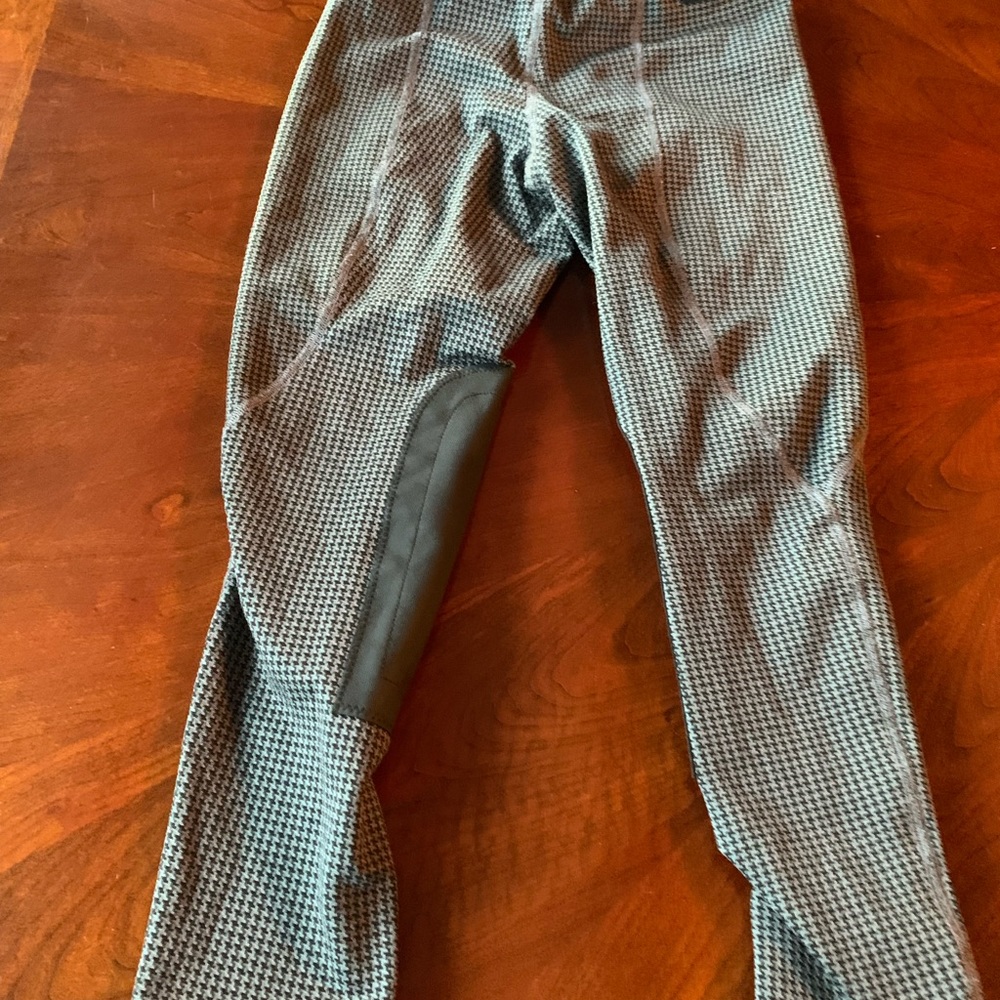 Kerrits Riding tights with knee patch. Grey and black checkered size girls large